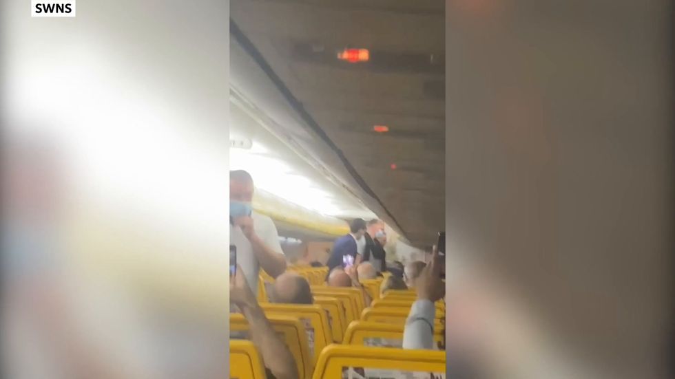 Fight breaks out between passengers onboard Ryanair flight leaving staff helpless in the chaos