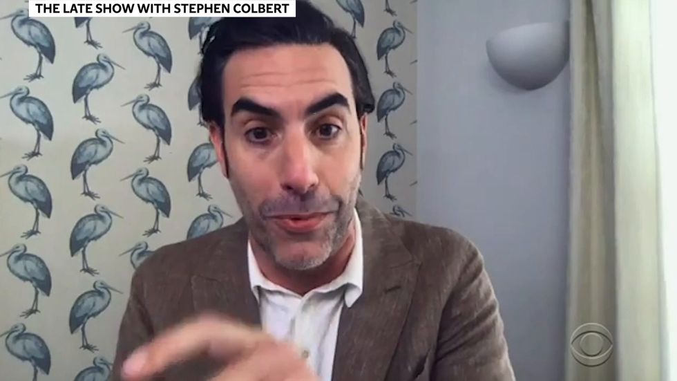 Sacha Baron Cohen describes chaos at gun rally following 'Wuhan flu' Borat 2 song