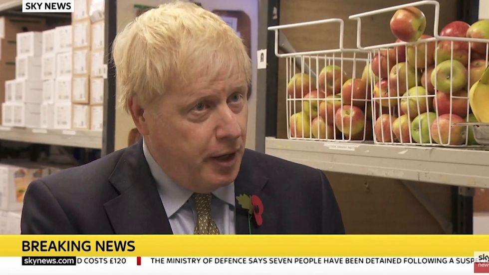 Boris Johnson defends government's handling of free school meals