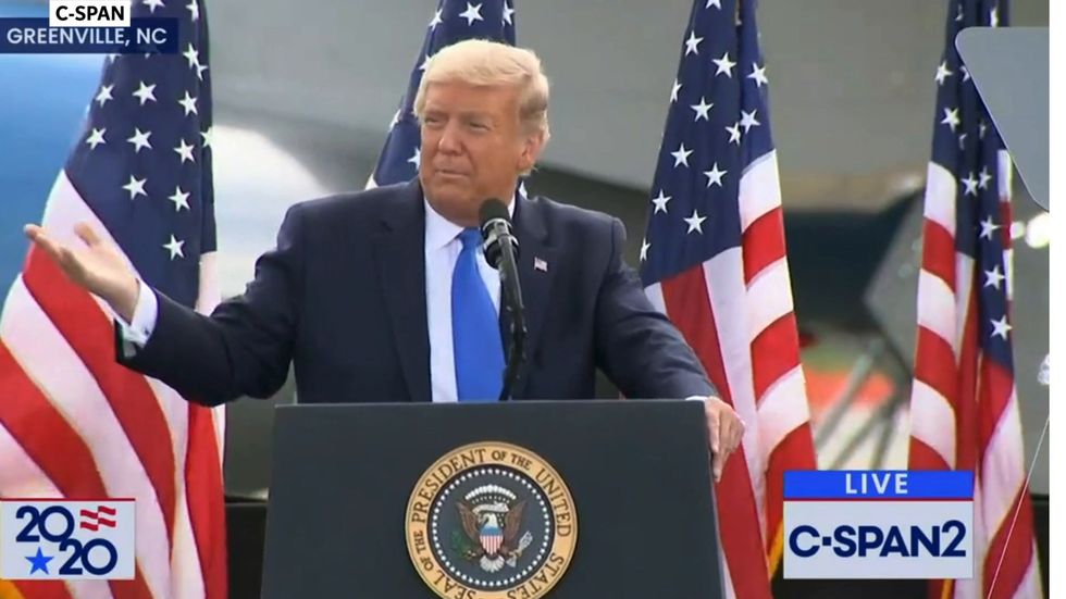 Trump criticises Fauci on early mask guidance