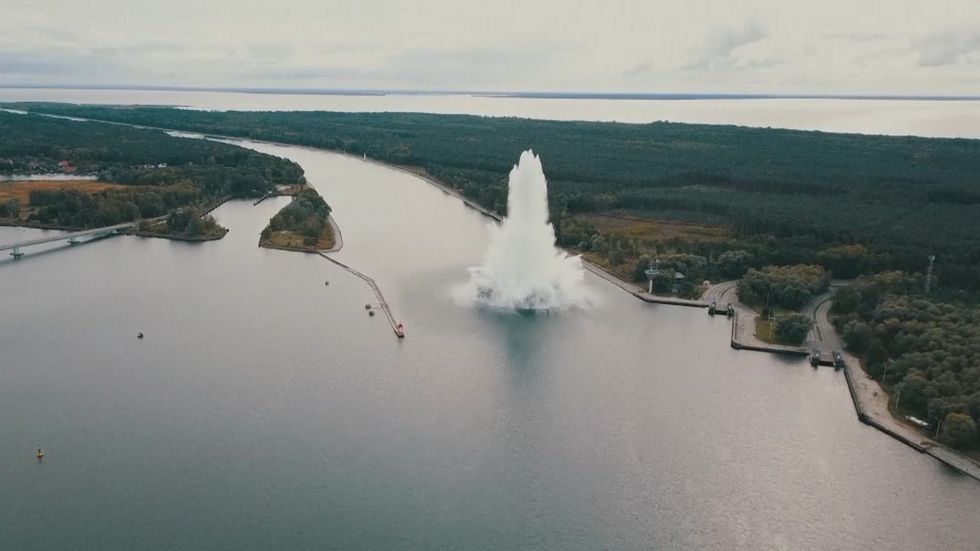 Moment World War II Tallboy bomb explodes underwater in Poland