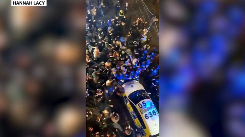 Large crowds pour onto streets in Liverpool on eve of tier three restrictions
