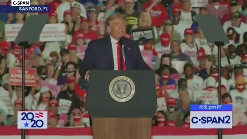 Trump says he will 'kiss the guys and the beautiful women' at Florida rally