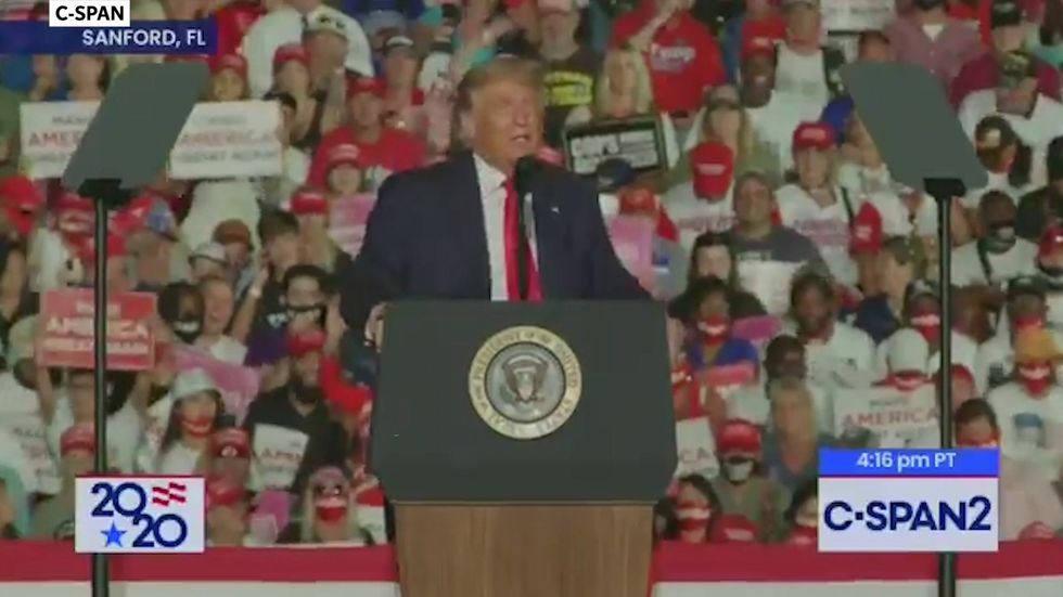 Trump says he will 'kiss the guys and the beautiful women' at Florida rally