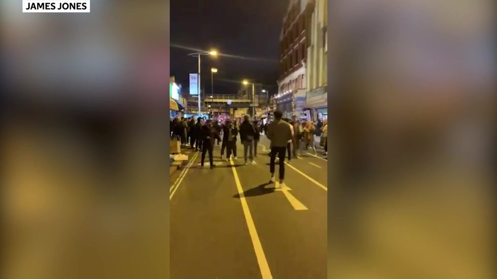 Post-curfew street cricket as drinkers enjoy last hurrah before tighter Covid rules