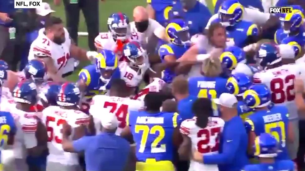 Family feud boils over as two NFL players fight on field after game