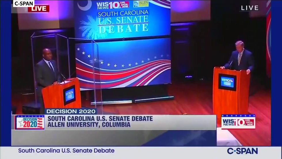 Democrat Jamie Harrison puts up glass shield between him and Lindsey Graham