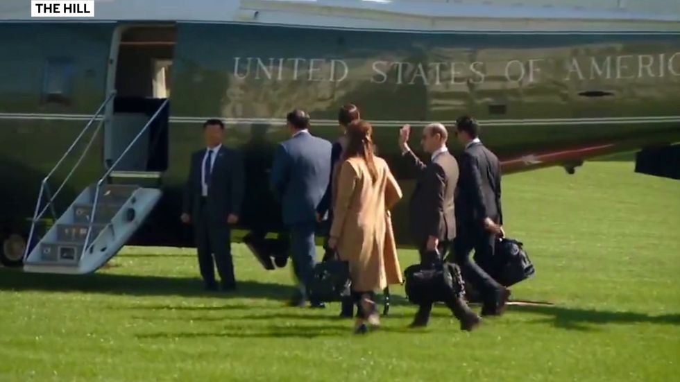 Hope Hicks boards Marine One after Donald Trump