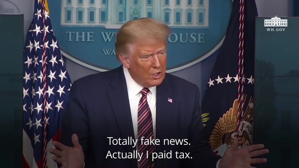 Trump dismisses tax story as 'fake news'