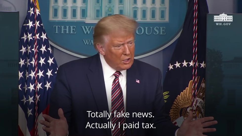 Trump dismisses tax story as 'fake news'