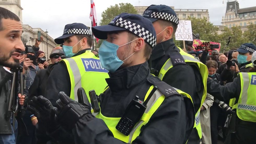 Police clash with anti-lockdown protesters in central London