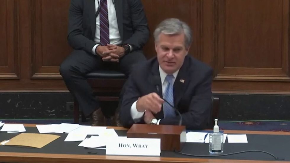 FBI director Christopher Wray warns of 'drumbeat of misinformation' to undermine confidence in election