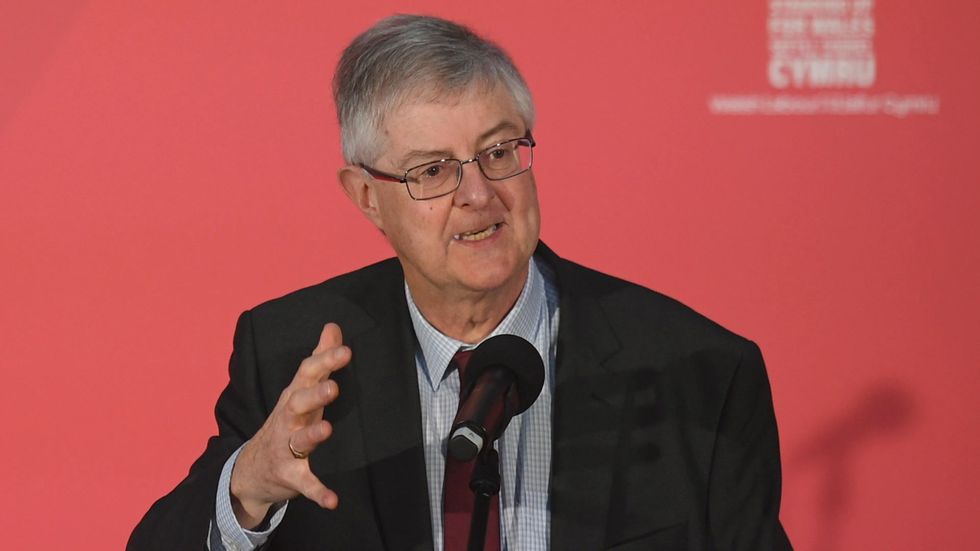 Welsh first minister says 'things are not as difficult' as England as Wales imposes restrictions on gatherings