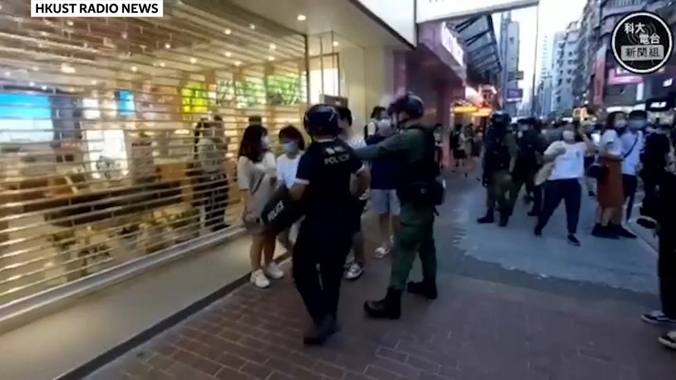 12 year old Hong Kong girl violently arrested for running 'in a suspicious manner'