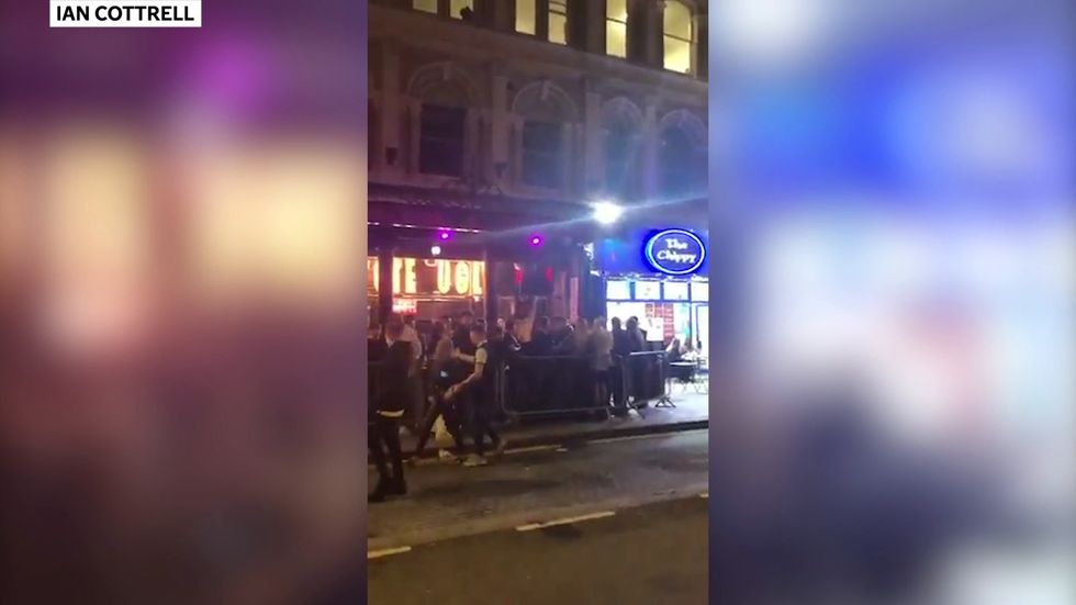 Long queues pictured outside Cardiff pub despite social distancing restrictions