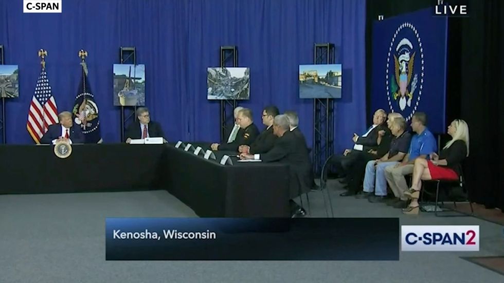 Trump meets shop's former owner in Kenosha when current one refuses to talk to him