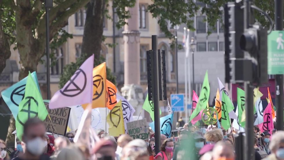 Arrests made as Extinction Rebellion protesters block streets around Westminster