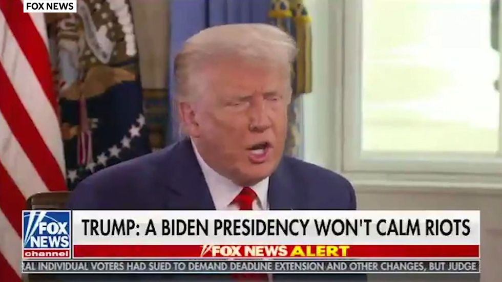 Trump warns Joe Biden beholden to mysterious people 'pulling the strings'