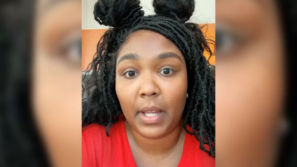 Lizzo calls on people to 'stop rewarding negativity'