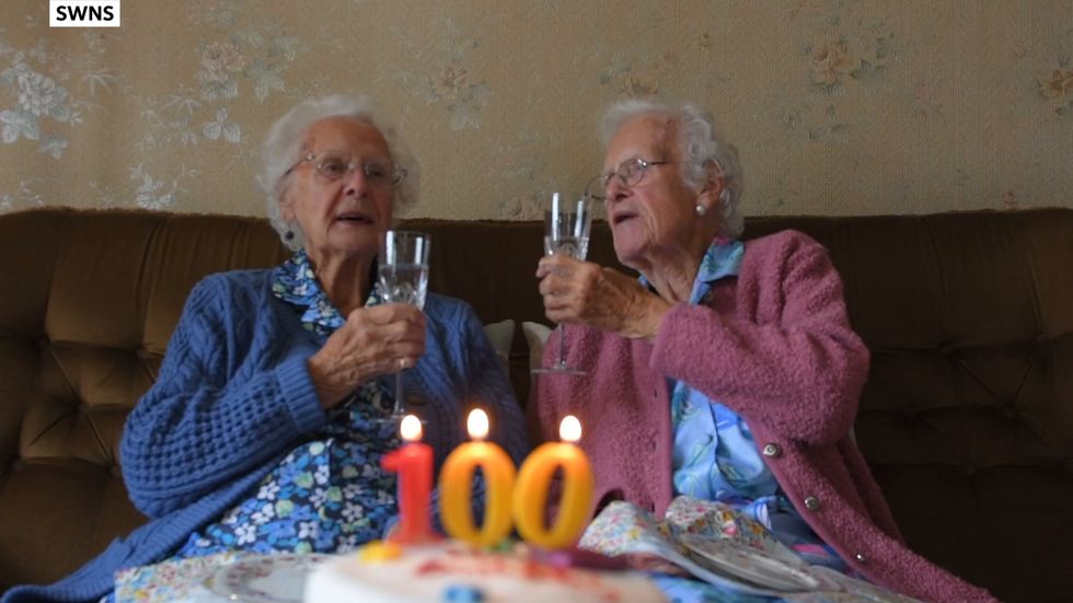 Britain's oldest identical twins celebrate their 100th birthday