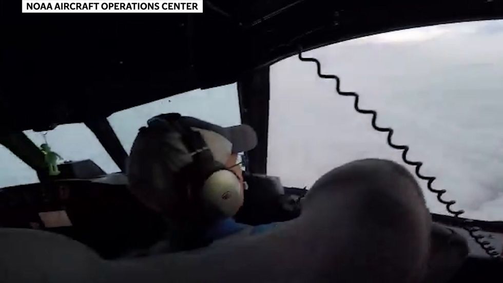 Turbulence shakes hurricane hunters' plane as it leaves eye of storm