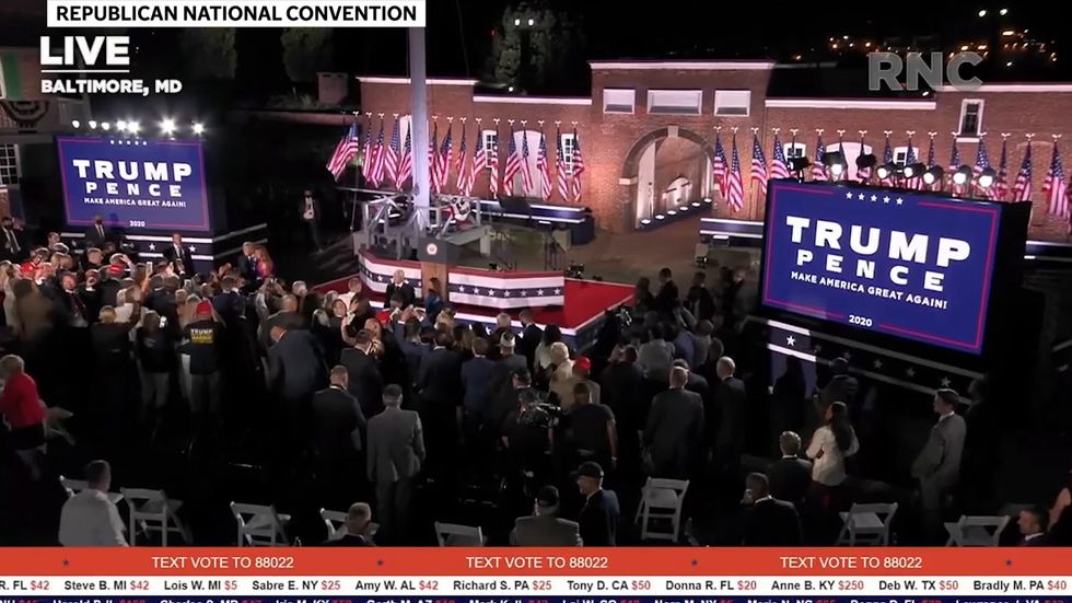 Mike Pence fist-bumps crowd without mask after RNC speech