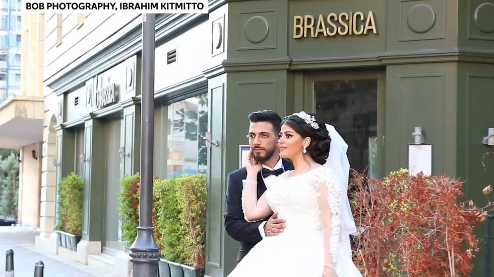 Beirut: Terrifying moment windows are blown out behind newlyweds as explosion hits