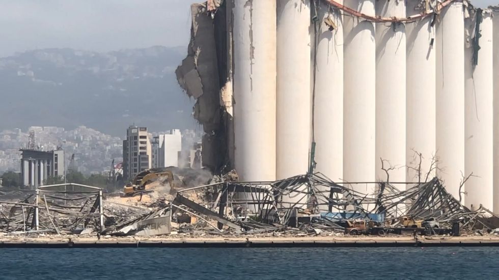 View from the ocean of Beirut's devastated port after warehouse explosion