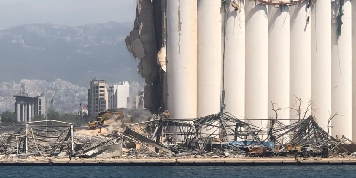 Port Explosion View from the ocean of Beirut's devastated port after warehouse ...