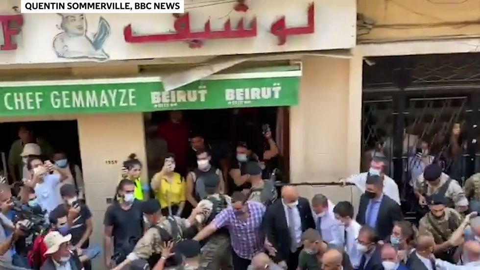 President Macron mobbed in streets of Beirut while protesters declaim Lebanon's President Aoun