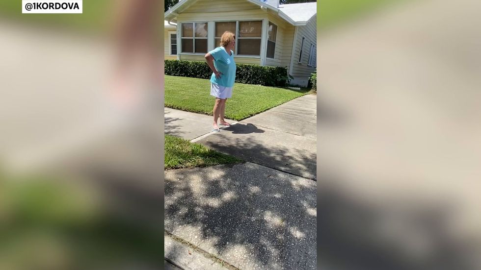Florida woman hurls racial slurs at Black landscapers