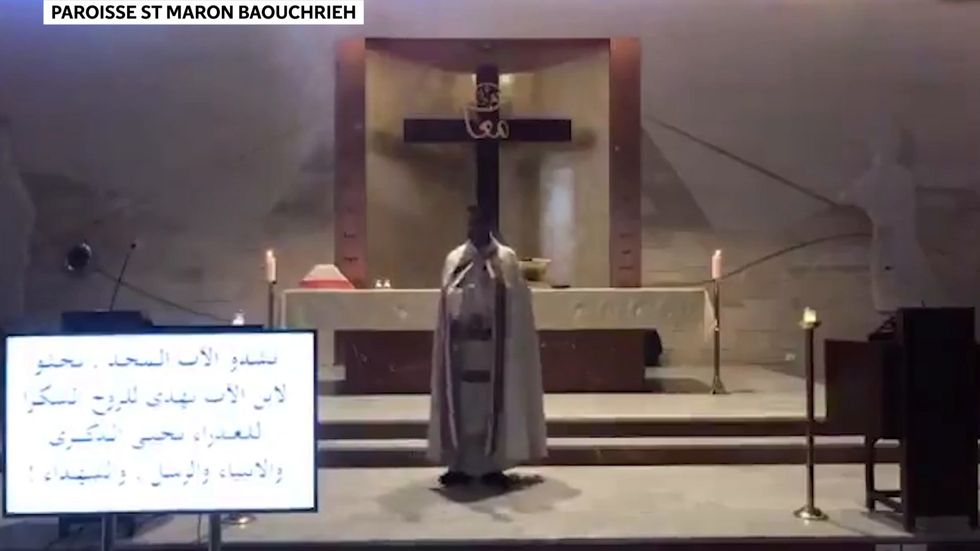Beirut: Livestream footage captures moment priest dodges falling rubble as explosion hits during mass