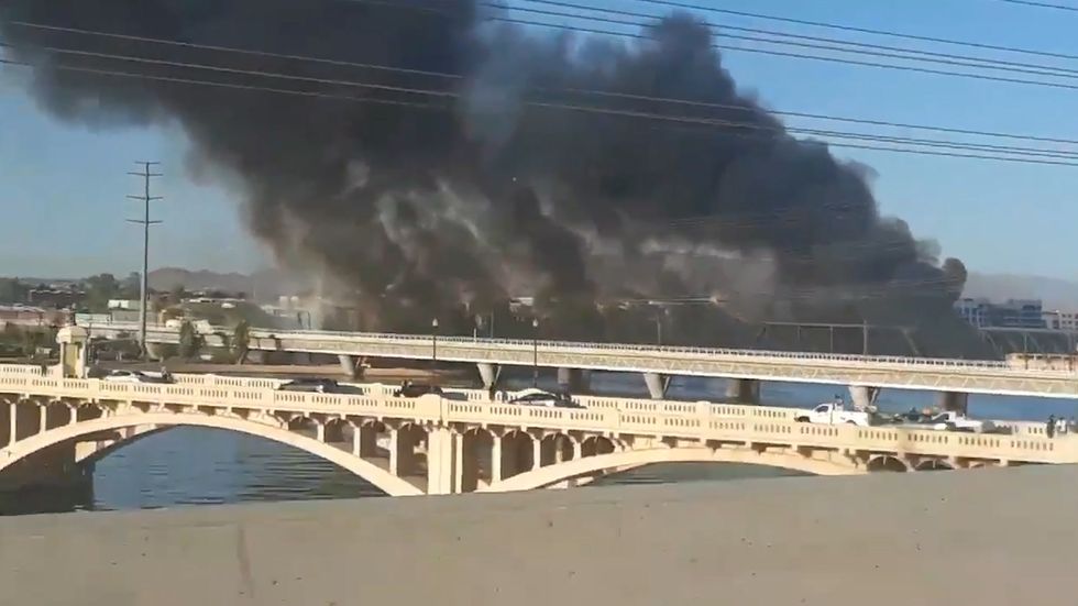 Bridge burns after train derails in Tempe, Arizona