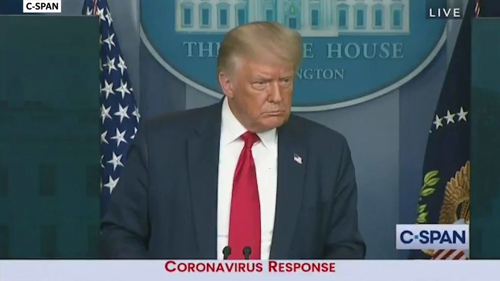 Trump defends doctor who claimed medicine is made from alien DNA and walks out of briefing mid question
