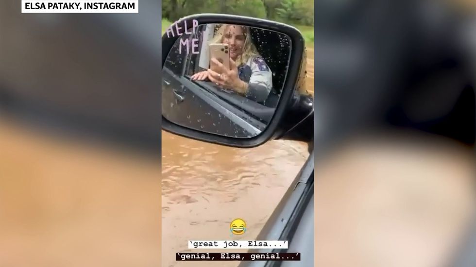 Elsa Pataky escapes flood in Australia through car window