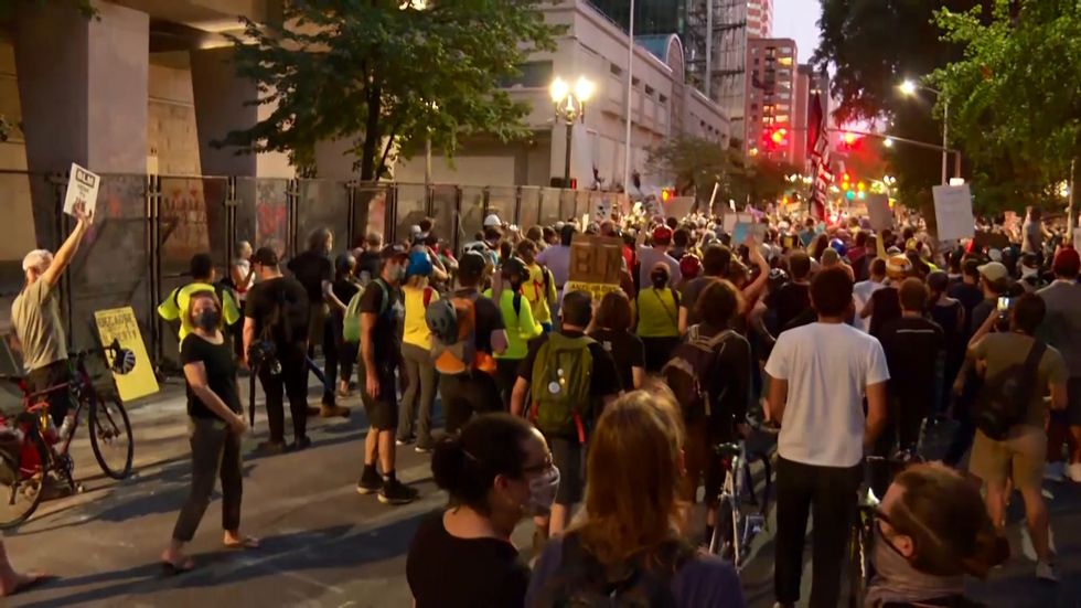 'Wall of Moms' joins Portland's anti-racism protests