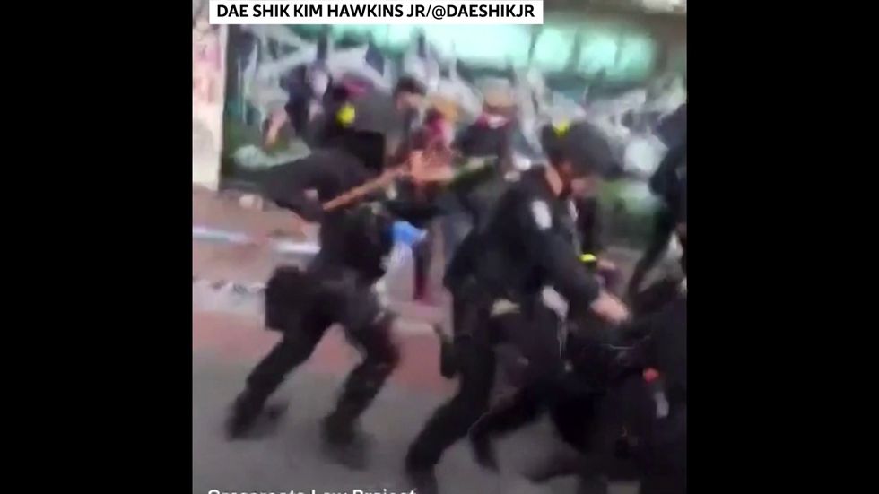 Police attack protesters with pepper spray in Seattle