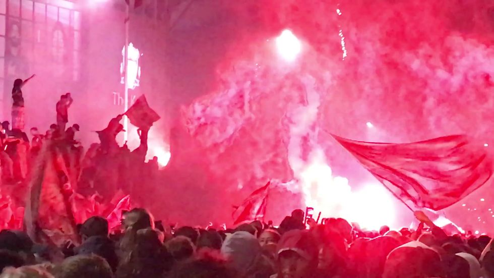 Fireworks and flares set off at Anfield as Liverpool lift the Premier League trophy