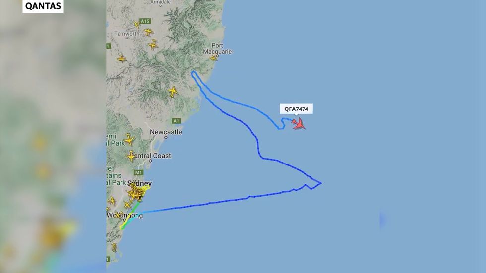 Qantas 747 plane draws kangaroo in the sky during final journey from Australia