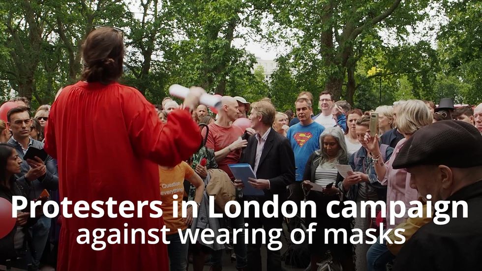 Protesters in London campaign against wearing masks