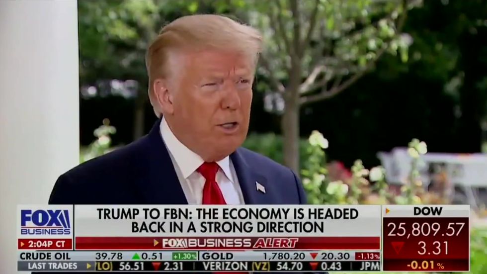 Trump claims coronavirus is going to 'just disappear' as US sees record number of new cases