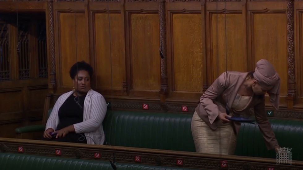 Labour MP Claudia Webbe struggles to turn off ringing phone during Commons debate