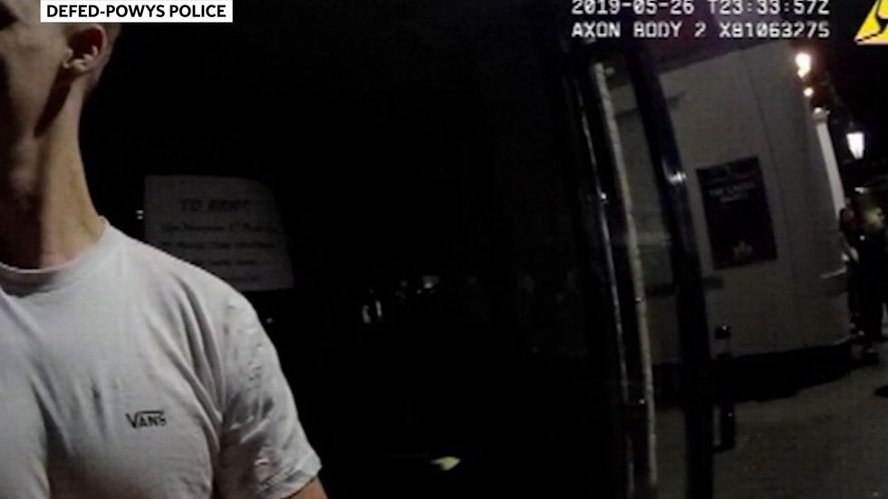 PC caught on camera assaulting handcuffed detainee