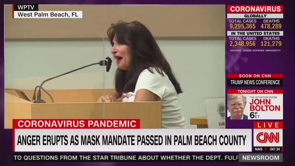 Florida women shout conspiracy theories about face coverings during public hearing