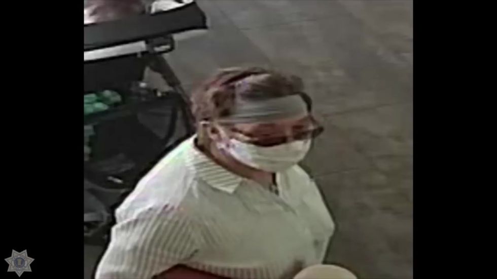 Police search for woman who 'coughed in baby's face'