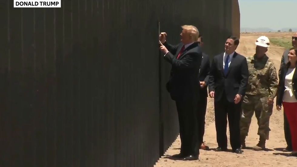 Donald Trump signs the Border Wall near Yuma, Arizona