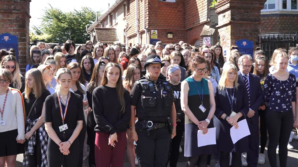 Silence held outside school where victim of Reading attack worked