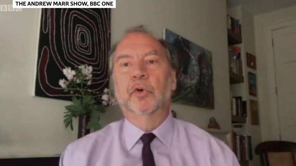 Leading scientist says 14 day quarantine for travellers is 'completely useless'