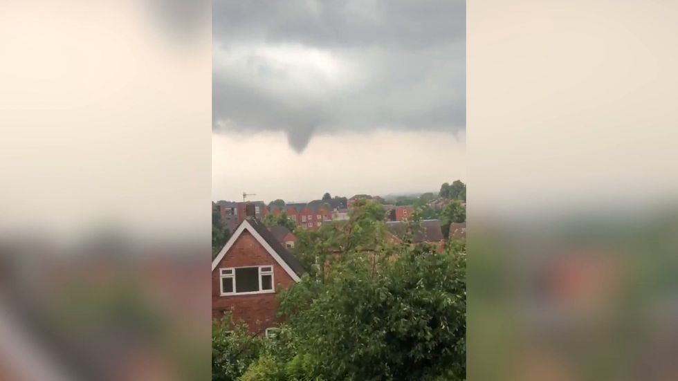 Funnel cloud forms in Nottingham as storms hit England and Wales
