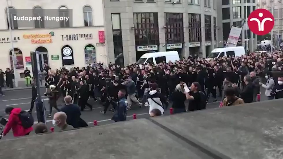 Protests take place in Hungary outside Roma building following murders